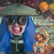 Surrounded By A Gaggle Clowns